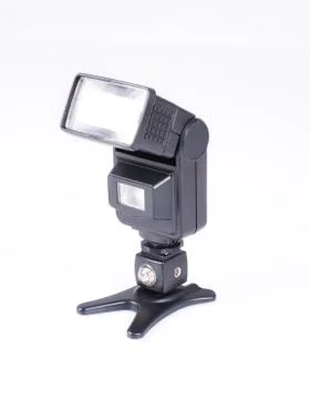 Flash for a camera on a white isolated background. Studio flash light Stock Photos