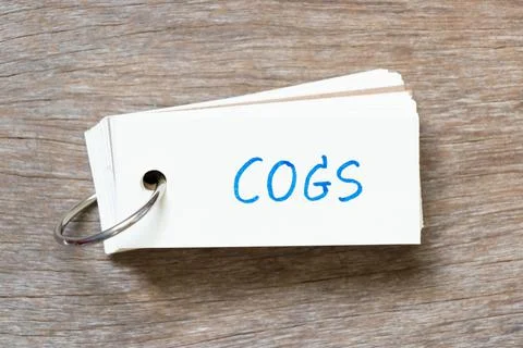 Flash card with handwriting in word COGS (Abbreviation of Cost of goods sold) 스톡 사진