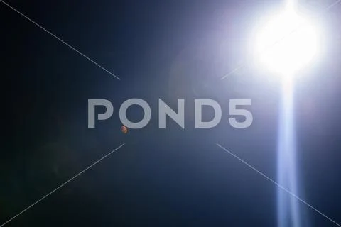 Flash of a distant abstract star. Abstract sun flare. The lens flare is subje Stock Photos