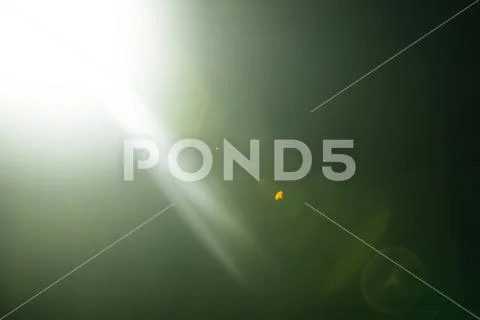 Flash of a distant abstract star. Abstract sun flare. The lens flare is subje Stock Photos
