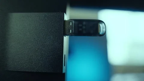 Flash drive inserted into computer in office or house by person hacker or spy Stock Footage 336465361