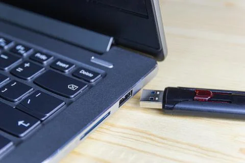 Flash drive with laptop computer for conncet to USB port Stock Photos