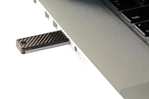 Flash drive plug in to computer Stock Photos