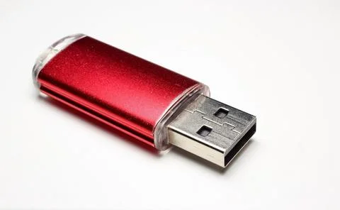 Flash drive red on white background closeup Stock Photos