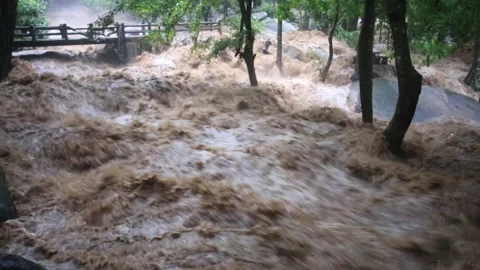 Flash flood flows turnovers Stock Footage 252497459