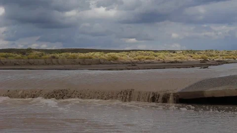 Flash Flood Washes out Desert Road Vídeo Stock 80916607