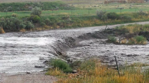 Flash flood washes out road Video stock 61216890