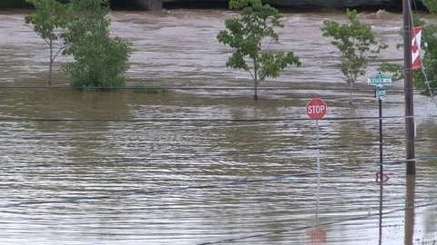 Flash flooding after severe thunderstorms and heavy rain in Grand Valley Canada Stock Footage
