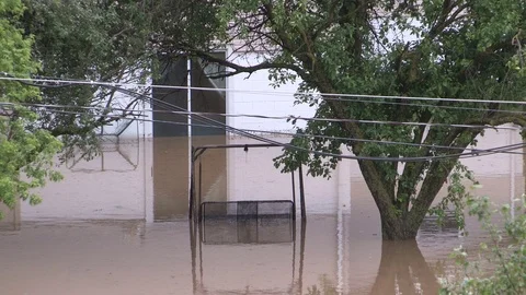 Flash flooding after severe thunderstorms and heavy rain in Grand Valley Canada Stock Footage