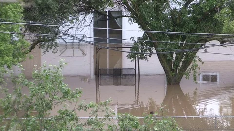 Flash flooding after severe thunderstorms and heavy rain in Grand Valley Canada Stock Footage