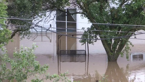 Flash flooding after severe thunderstorms and heavy rain in Grand Valley Canada Stock Footage