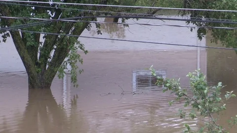 Flash flooding after severe thunderstorms and heavy rain in Grand Valley Canada Stock Footage