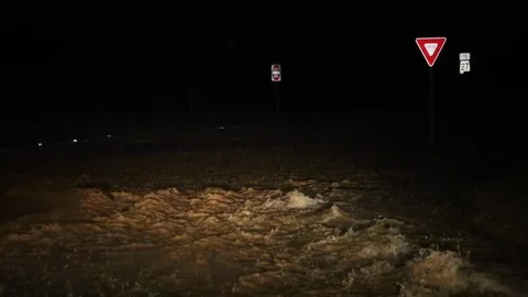 Flash Flooding During Rain Storm at Night Stock Footage 124336602