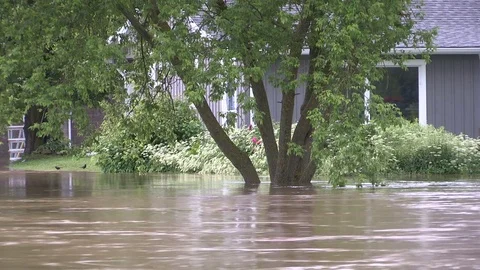 Flash floods after severe thunderstorms and heavy rain in Grand Valley Canada Stock Footage 76974525