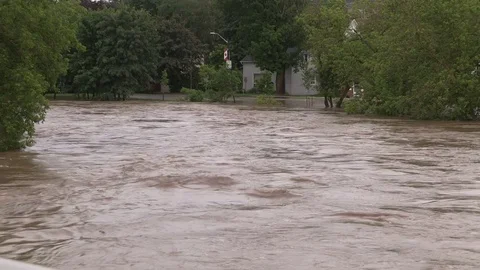 Flash floods after severe thunderstorms and heavy rain in Grand Valley Canada Stock Footage