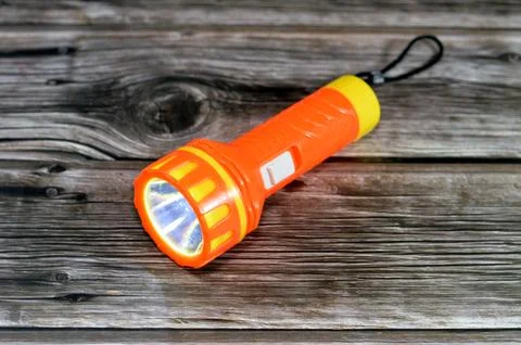 Flash light or electric torch, a portable hand-held electric lamp, consists.. Stock Photos