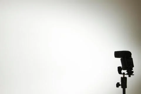 Flash light on studio wall Stock Photos