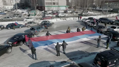 Flash mob action of veterans of the Russian wars with the state flag in supp Stock Footage 171425004