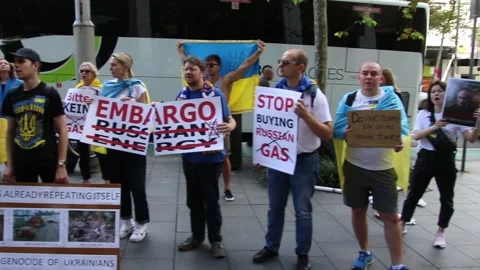 Flash Mob at German Consulate to protest Germany doing business with Russia Stock Footage 179851135