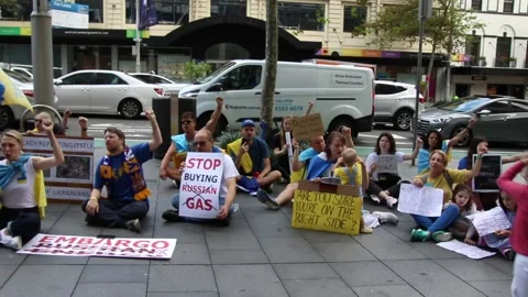 Flash Mob at German Consulate to protest Germany doing business with Russia 스톡 동영상 179851143