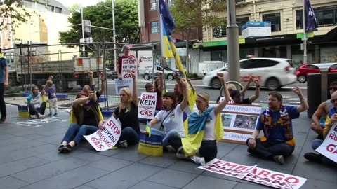 Flash Mob at German Consulate to protest Germany doing business with Russia Stock Footage 179851218
