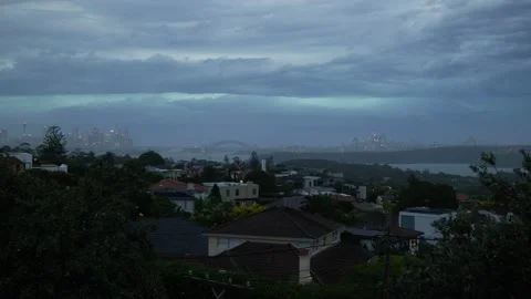 Flash in sky during start of Sydney storm 6K Stock Footage 298356133