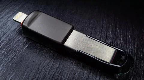 Flash usb data storage with lightning converter Stock Photos