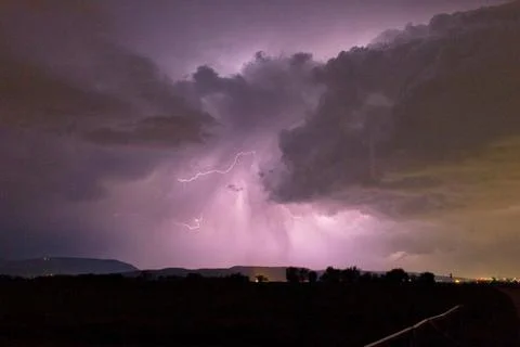 Flashes in the cloud in a thunderstorm Stock Photos