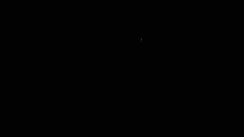 Flashes of fireworks in the night sky. Stock Footage 132251637