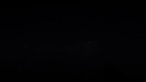 Flashes of Thunder Light Up the Storm Clouds in the Night Stock Footage 308961552