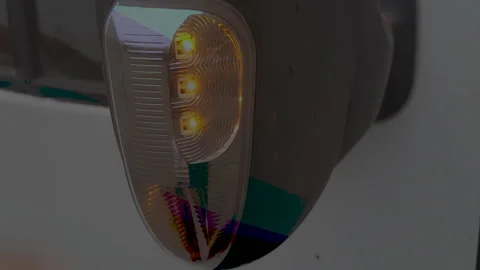 Flashing car headlight Stock Footage 121056203