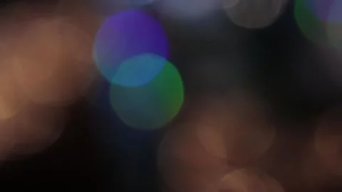 Flashing colored bokeh moving to the left 動画素材 317461981