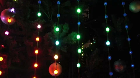 Flashing colored lights on a christmas tree Stock Footage 147602531