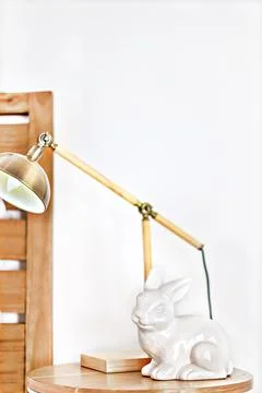 Flashing lamp on the table with rabbit statue toy Foto stock