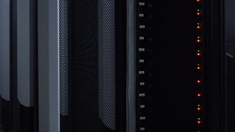 Flashing LED lights at working data servers. Orange and green lights. 4K Video stock 108609964