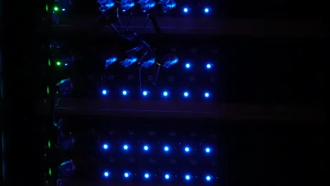 Flashing LEDs in data center with stage splitter device Stock Footage 302677877