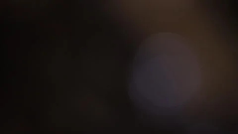 Flashing light moving back and forth from the right side of the blurred backgrou Video stock 309421406