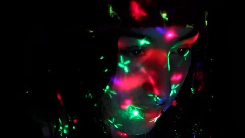 Flashing lights on girl Stock Footage 80824088