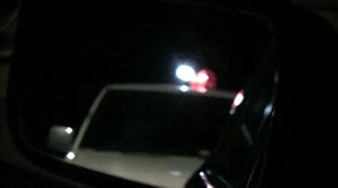 Flashing lights in mirror Stock Footage 8997688