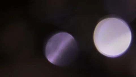 Flashing lights from the right side of the blurred background Vidéo 309421197