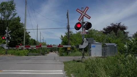 Flashing Lights Warn That A Train Is Approaching. 動画素材 198516007