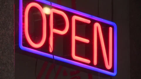 FLASHING NEON OPEN SIGN LITE UP AT NIGHT Stock Footage 335178542