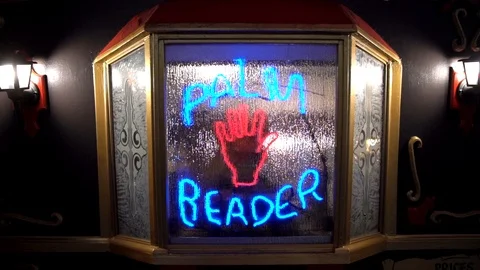 Flashing neon palm reader fortune teller sign Stock Footage 96786338