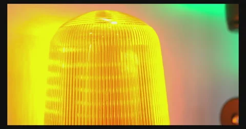 Flashing orange rotating emergency light on white background Stock Footage 313066211