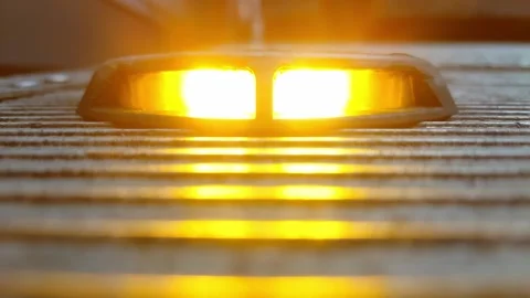 Flashing orange warning light close up Stock Footage 335545716