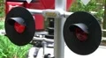 Flashing Railroad Signal with Train Passing HD Footage