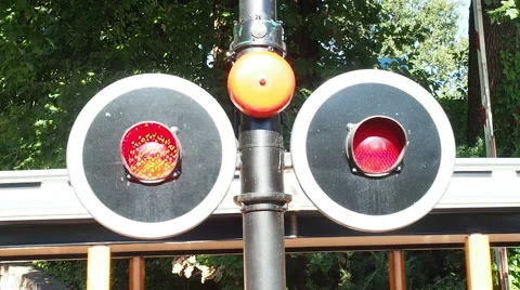 Flashing red lights at level crossing Stock Footage 66730680