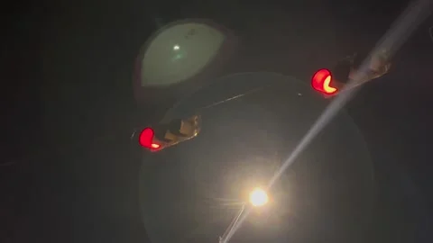 Flashing red stop lights at night in Austin, Texas on 9-28-2025 Stock Footage 317937926