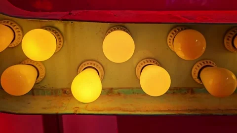 Flashing row of carnival lightbulbs horizontal video Stock Footage 335540734