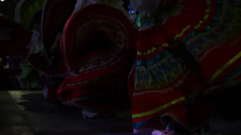 Flashing strobe light during Mexican cultural dance with women in big flowing Stock Footage 264160197